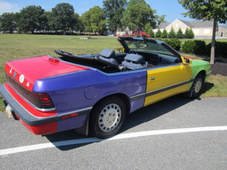 Illustration for article titled For $1,000, This 1989 Chrysler LeBaron Will Let You Clown Around
